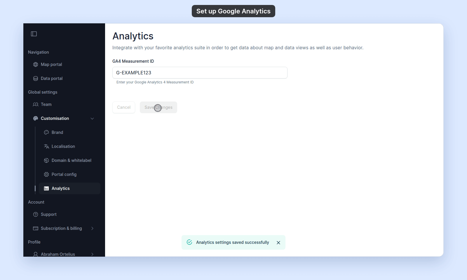 Analytics page with G-EXAMPLE123 in the GA4 Measurement ID field and the toast Analytics settings saved successfully