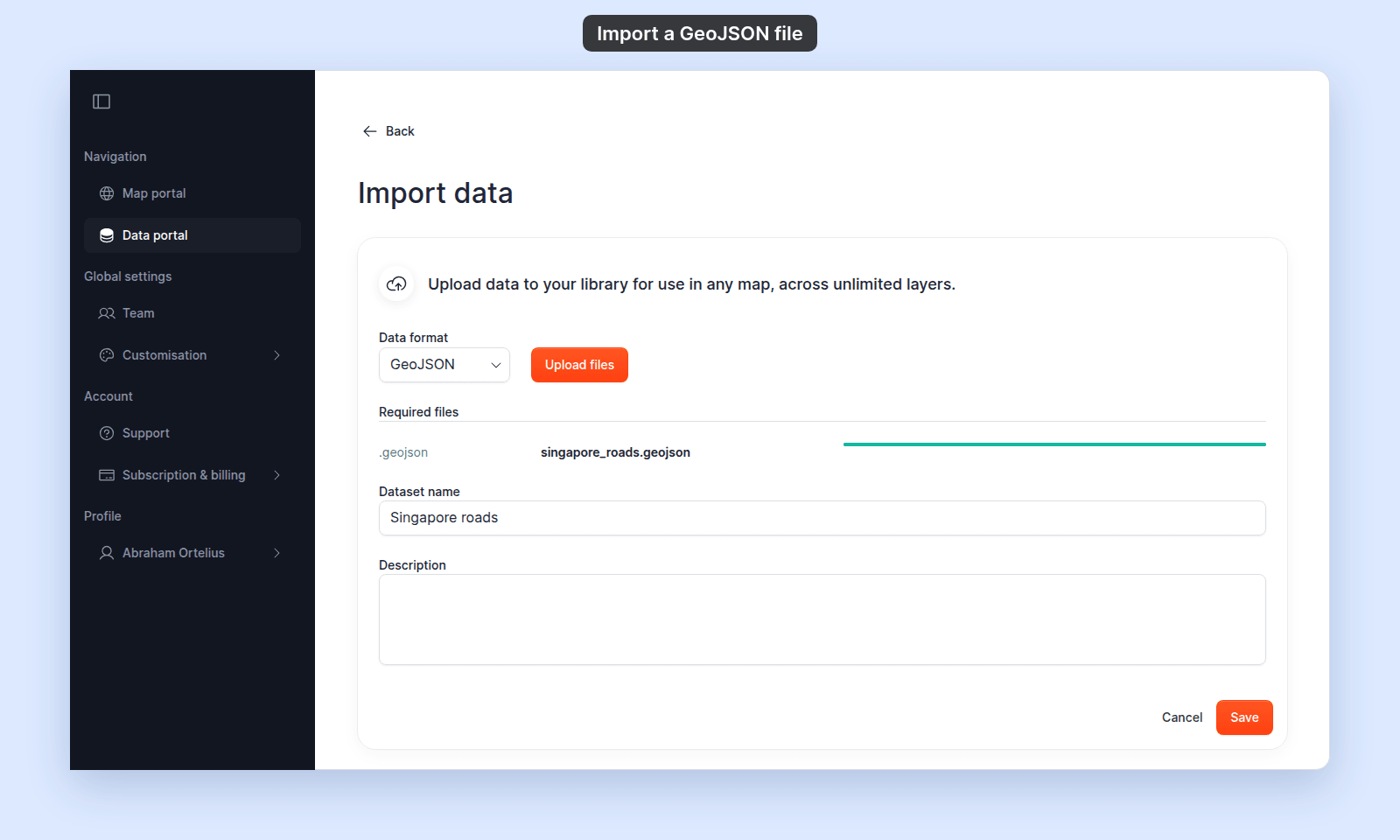 Import data page with Data format set to GeoJSON, singapore_roads.geojson with a full green progress bar, Dataset name Singapore roads, an empty Description, and the Cancel and Save buttons